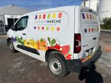 a van that is parked in front of a building