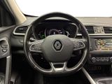 the interior of a car with a steering wheel and dashboard controls
