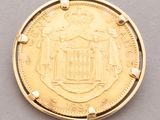 an image of a close up of a coin on a table