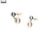 pair of pearl and gold earrings on a white background