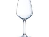 a wine glass that is sitting on a table