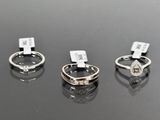 three different types of rings are shown on a black surface