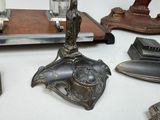 a lot of antique items that are on the table