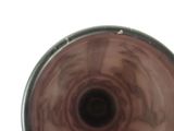 a close up view of a glass with a hole in it