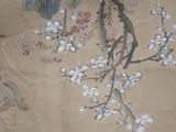 a picture of a painting of birds and flowers on a wall