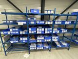 a large amount of boxes on the shelves in the warehouse