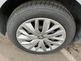 a close up of a tire on a car ' s rim