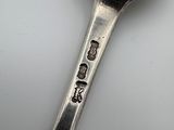 a spoon that has some writing on it
