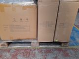 boxes on a pallet in a warehouse are stacked on top of each other