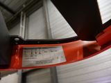 a close up of a red object in a building