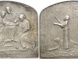 two silver medallions depicting the last supper of jesus and the last supper of jesus
