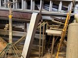 a pile of assorted metal items in a warehouse