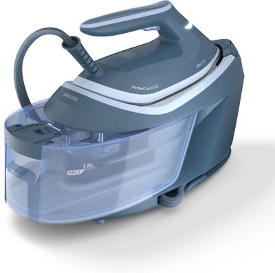 an image of a blue and white steam iron on a white surface