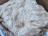 a box with a large rock inside of it