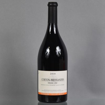 a bottle of wine that is sitting on a table