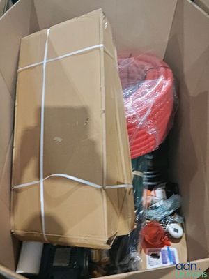 a cardboard box with a bunch of items inside of it