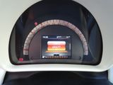 a close up of a car dashboard with a speedometer