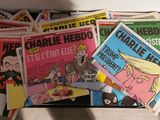 a lot of comic books on the table