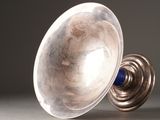 a silver object that is sitting on a table
