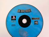 a cd on a white surface with a blue disc