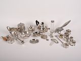 a lot of silver items that are on a table