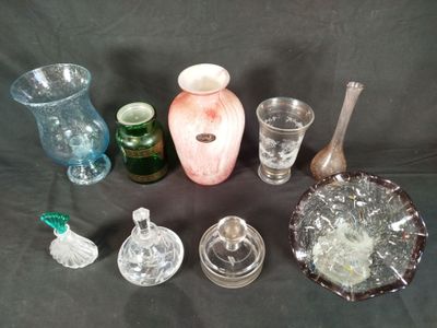 a lot of glass items that are on a table