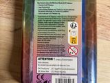 a plastic container with a label on it on a wooden table