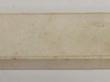 a small box that has a piece of paper on it