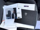 a black folder with a picture of a man on it