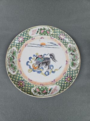 a plate with a picture of a bird on it