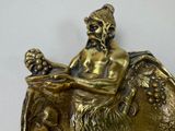 a statue of a man sitting on top of a horse