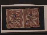 deux timbres représentant une femme et un homme