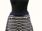 a black and white striped shorts on a mannequin mannequin