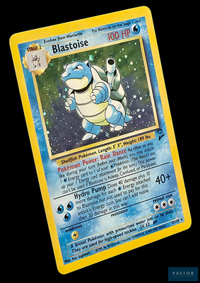 une carte Pokémon sur laquelle figure un Pokémon bleu et blanc