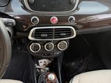 the interior of a car with a dashboard and steering controls