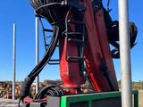 a crane that is sitting on the back of a truck