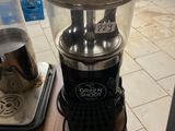 a blender that is sitting on a table in the kitchen