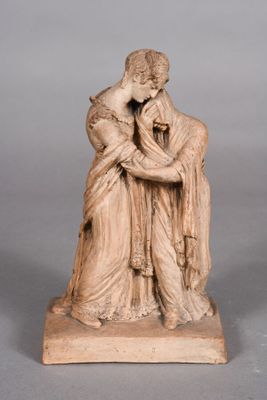 an image of a statue of a woman holding a child