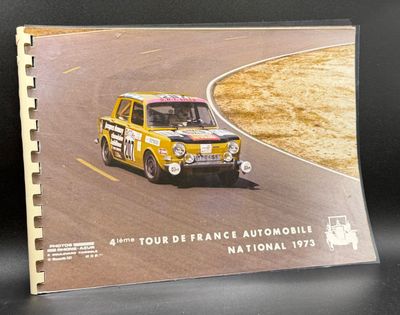 an old photo of a yellow car driving on a track