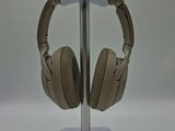 a pair of headphones that are on a stand