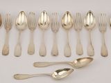 a lot of spoons and spoon spoons on the table