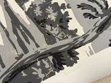 a black and white drawing of a tree with a bird on it