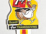 une affiche représentant une dinde sur laquelle on peut lire « 7 Up »