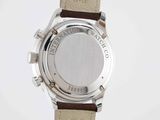 an image of a close up of a watch on a white surface