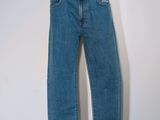 jeans on a mannequin stand on a white background