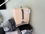 a small desk with a printer, printer, and other items on top of it