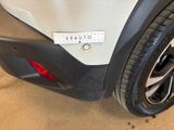 a close up of a car with a sticker on it ' s bumper