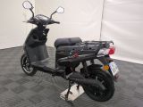 a scooter that is parked in a room