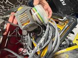 a person that is working on some electrical equipment