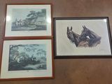 three framed prints of horses and riders on a wall in a room